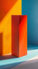 Wall Mural - A red and orange cube is sitting in front of a blue wall