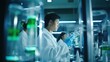 © ChimE - A focused scientist conducting detailed chemical experiments in a professional laboratory setting.
