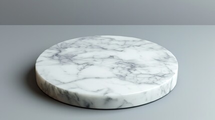 Poster - Round marble texture board on gray background. Top view. Copy space.