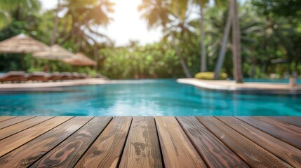 Poster - For displaying or montaging your products, a tropical resort in summer has an empty table top and blurry swimming pool backdrop.