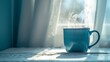© MaxStock - Steaming Blue Mug of Hot Beverage on Table by Window