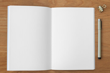 Poster - Blank notebook page with a bulldog clip and a pen design element