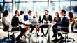 © N7 - Business Team Meeting Blur: A blurred meeting room with a business team discussing strategies, suitable for teamwork and collaboration themes.