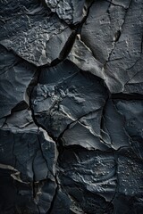 Wall Mural - A close-up shot of a rock with visible cracks and fissures