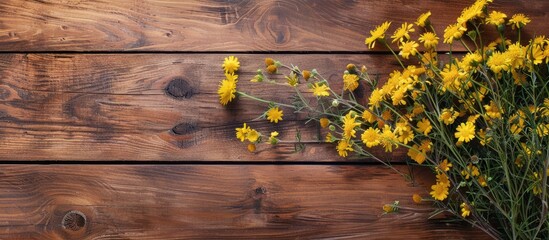 Aufkleber - Top view of yellow flowers on a wooden surface with copy space image available for text or design elements