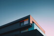 © ADDICTIVE STOCK - Modern building facade at dusk with vibrant lighting. Generative AI image