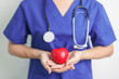 © Jo Panuwat D - Doctor hand holding red heart shape in hospital. love, donor, world heart day, world health day, CSR donation and Insurance concepts