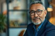 © Skyfe - Confident Senior Asian Man in Glasses - Corporate Business Portrait