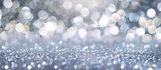 Aufkleber - Abstract defocused glitter backdrop with a silver white sparkle bokeh background providing ample copy space image