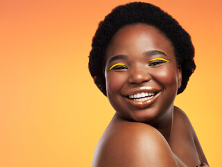 Wall Mural - Portrait, skincare and black woman with makeup, dermatology and luxury on yellow studio background. African person, face and model with artistic beauty, pigmentation and cosmetics with shine or glow