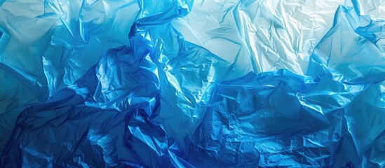 Fototapete - Reuse a clear blue plastic bag to create an eco friendly abstract texture image and help protect the environment. copy space available