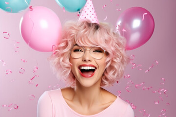 Wall Mural - Happy excited amused birthday woman wearing festive cap with colorful confetti and helium balloons on a pink background