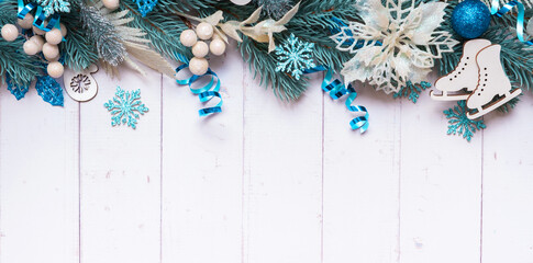 Wall Mural - Christmas banner background made from pine tree, berries and festive decorations with copy space.