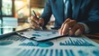 © Nene - Business Man Analyzing Data. Male Executive Examining Charts and Graphs, Interpreting Data for Strategic Business Decisions, Expert Analysis and Financial Planning for Corporate Growth.