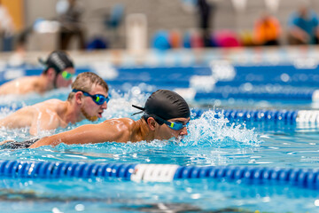 Men's swimming race, sports competition, indoor pool