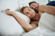 © Sanc/peopleimages.com - Relax, pillow and couple with sleeping in bed for comfort, commitment and tired in rest at home. Partner, peace and man with dreaming by woman in house for care, love and afternoon nap on weekend