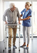 © peopleimages.com - Senior patient, physiotherapy and walking frame for health care service, retirement and disability support. Medical worker, nurse or physiotherapist helping old man with mobility with rehabilitation