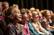 © shobakhul - A group of children are sitting in a theater, smiling and laughing, generative ai image.