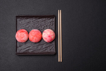 Delicious colorful asian mochi sweets with rice dough shell