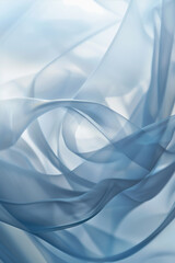 Wall Mural - blue silk background, close-up view of delicate blue fabric folds creating a soft and dreamy texture