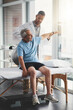 © JorSons/peopleimages.com - Physio, arm stretching and senior man with rehabilitation, exercise and healthcare check in clinic. Consultation, client and care with physical therapy, wellness and injury support with chiropractor