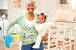 © peopleimages.com - Woman, portrait and cleaning in house with baby, spray and chemical for dust, bacteria and dirt in morning. Black person, face and happy in home with young child, container or basket for housekeeping