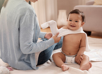 Sticker - Mom, baby and happy with dressing in home for care, support and child development or growth. People, parent and toddler or infant with smile on floor for fun, bonding and trust with excitement