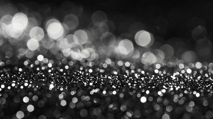Wall Mural - black and white bokeh background with sparkling lights and blurred circles, creating an abstract, fe