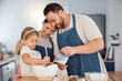 © peopleimages.com - Family, child and baking in house kitchen, home and kid assisting for culinary skills or bonding together. Teaching, girl development and mixing ingredients, apartment and support with people