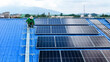 © ultramansk - engineer man inspects construction of solar cell panel or photovoltaic cell by electronic device. Industrial Renewable energy of green power. factory worker working on tower roof.