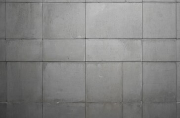 Sticker - Gray concrete wall with textured surface divided into square panels