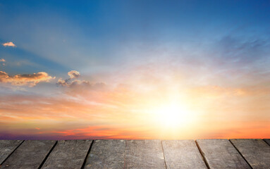 Wall Mural - wooden floor and sky sunset background