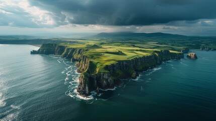 Wall Mural - Aerial view of rugged peninsula with cliffs on the ocean.