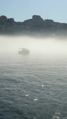 Canvas Print - Montenegro Adriatic sea harbor at misty morning, vertical video