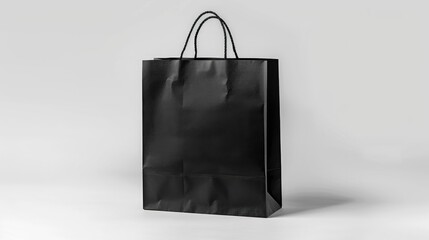 Poster - Paper shopping bag in black color against white background