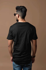 Wall Mural - Back view of a young arabic man wearing an all black crewneck mockup tshirt with copy space