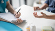 © Wanda - Healthcare Counsel Physician Giving Recommendations to Individual