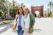 © oneinchpunch - Beautiful senior women bonding outdoors in the city - Attractive cheerful mature female friends having fun, shopping and bonding, concepts about elderly lifestyle