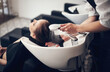 © CanBorg/peopleimages.com - Water, beauty and wash for client hair, hairdresser and treatment with tap and basin for washing. Hands, scalp and massage hairstyle for happy female person, keratin and shampoo for salon haircare
