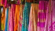 © MetaPixel - Colorful Indian sari textiles on display in local market