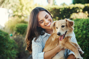 Canvas Print - Outdoor, woman and smile for dog hug with bonding time, loyalty and best friends together in garden. Happy pet owner, girl and embrace with puppy for love, mental health and emotional support animal