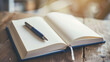 © VK Studio - An open journal with a pen rests on a wooden table bathed in soft sunlight, inviting thoughts, creativity, and the beginning of personal writing adventures.