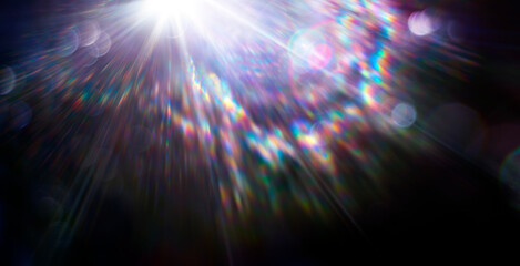 Wall Mural - colorful glow light effects on black - lens flare