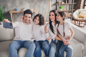 Poster - Photo of adorable charming mom dad children wear casual outfits tacking selfie modern device indoors room home house