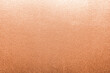 © Chinnapong - Copper gold background foil leaf metallic texture wrapping paper shiny orange wallpaper with smooth line for design decoration element