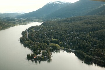 Wall Mural - Snow capped peaks in the Rocky Mountains, Vancouver Canada, taken from above in a sea plane.