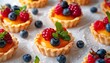 © DruZhi Art - Delectable Tartlets with Vibrant Orange Filling and Fresh Berries on Top, Organic Healthy Food