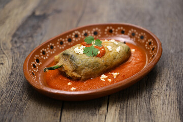 chile relleno (fried poblano pepper stuffed with minced meat and coated with egg meringue), Mexican cuisine