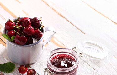 Wall Mural - organic cherry jam and fresh berries