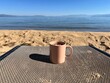© Stouthouse Design - cup of coffee on Lake Tahoe beach